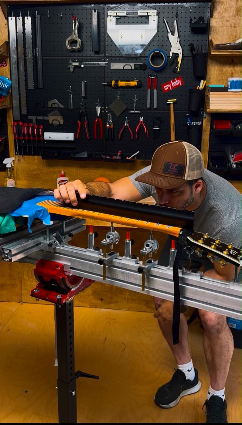 Fret leveling on the neck jig